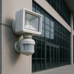 Motion light sensor mounted on a large building